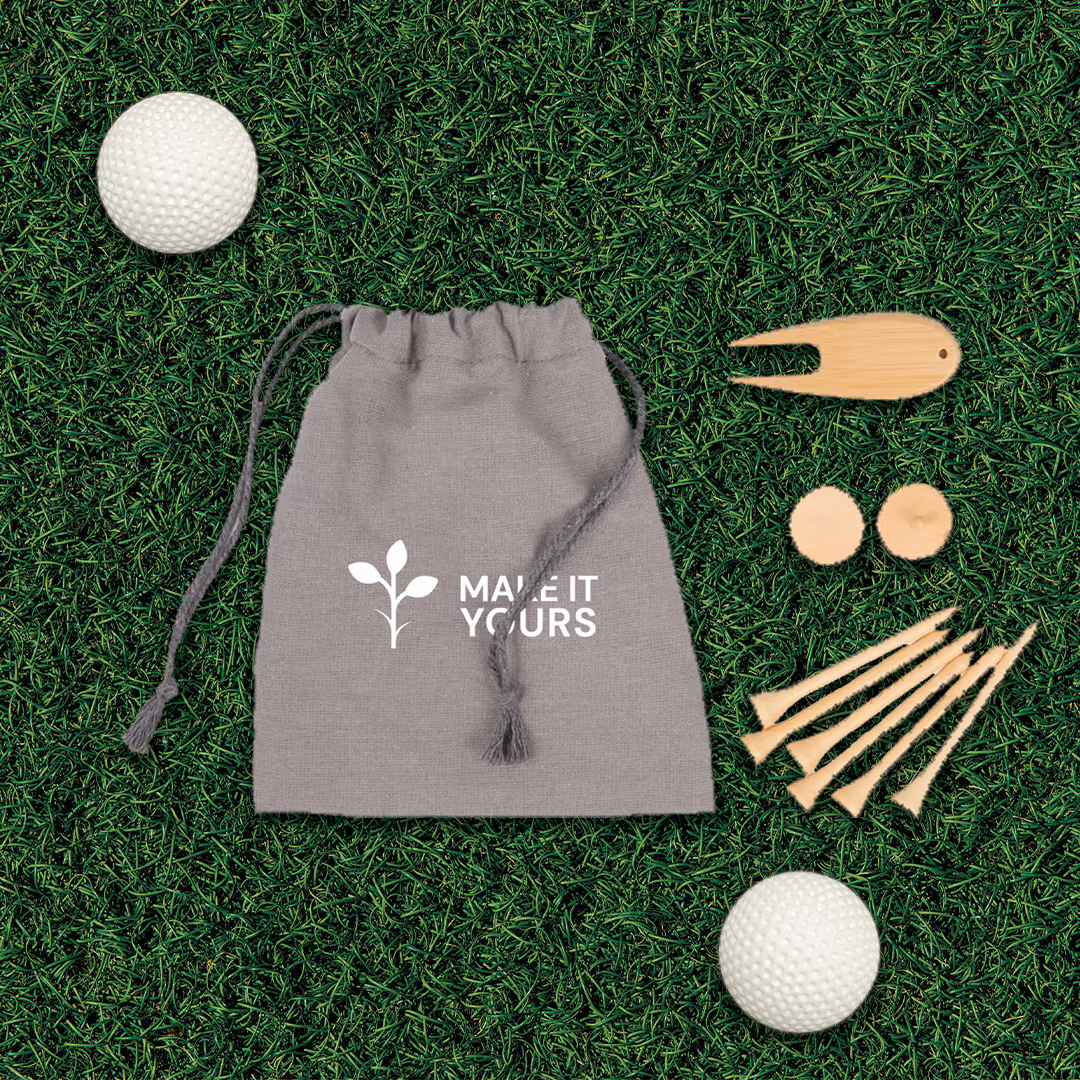 golf tee set laying on grass of golf green